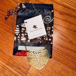 Noonday heart necklace with pouch